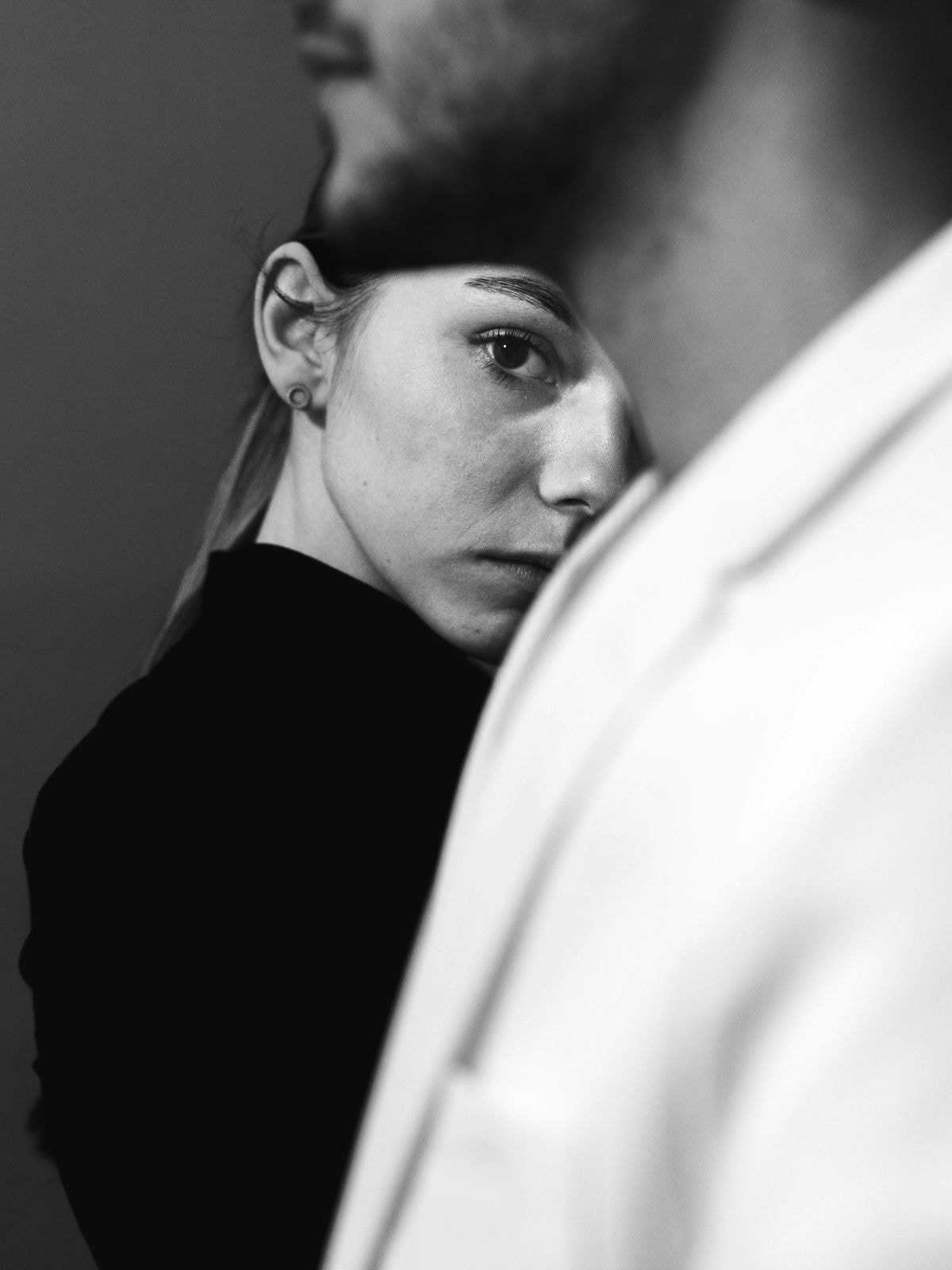 A couple in an intimate editorial moment